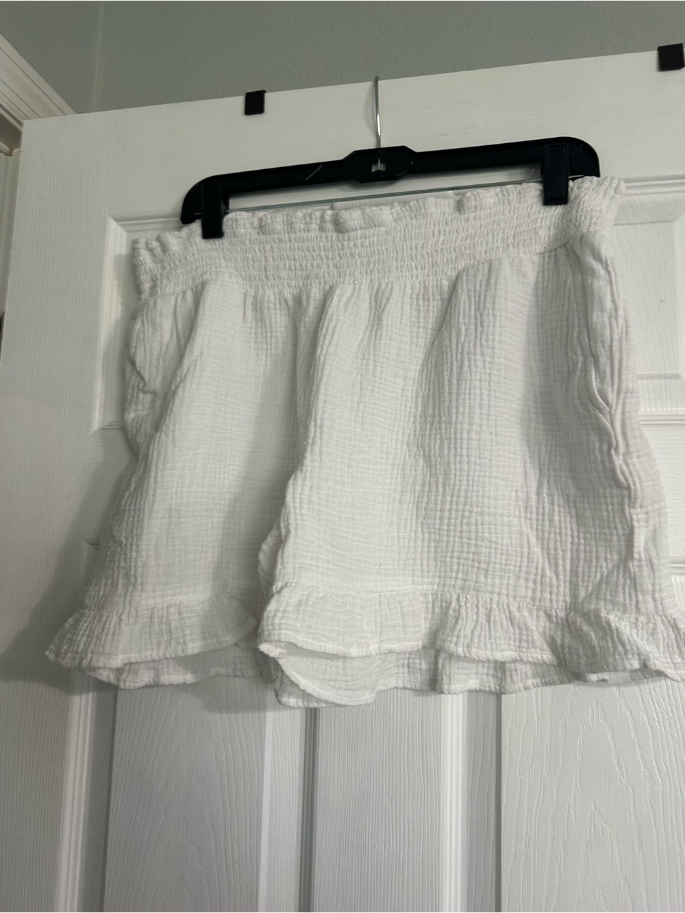 White Ruffle Hem Smocked Waist Shorts